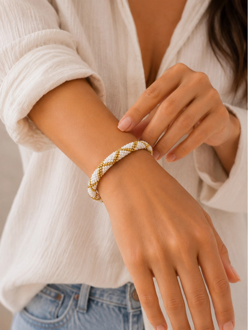 BRACELET NÉPALAIS BLANC DORÉ